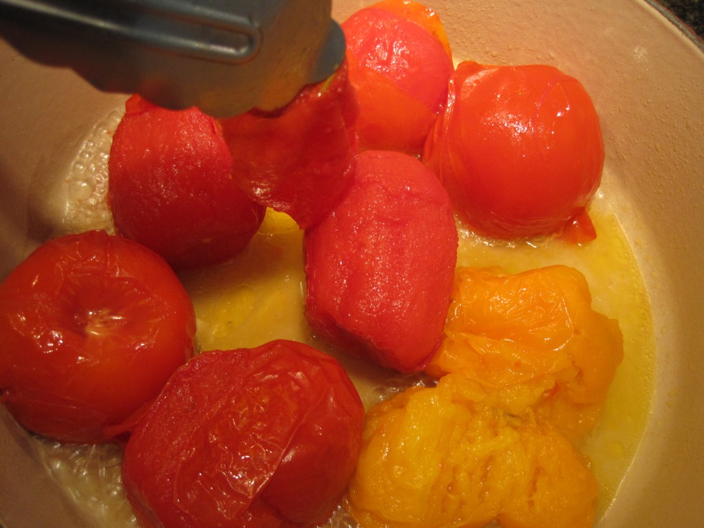 Taking the skins off the tomatoes