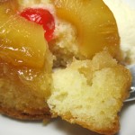 fork taking a piece of a Mini Pineapple Upside Down Cake