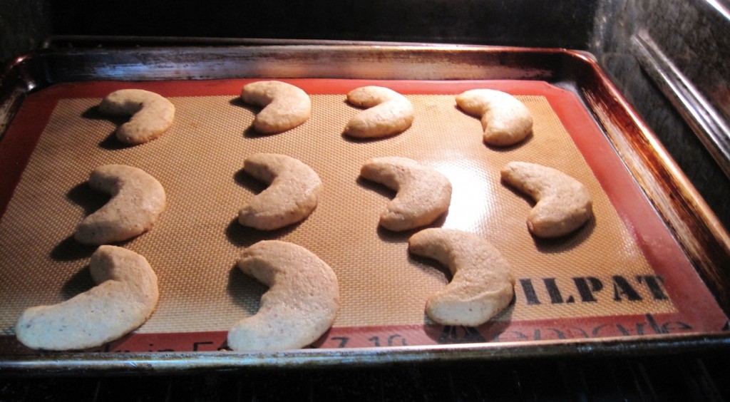 Almond Crescent Cookies baking in the oven.